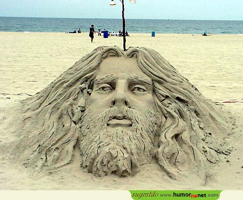 Cristo na areia da praia